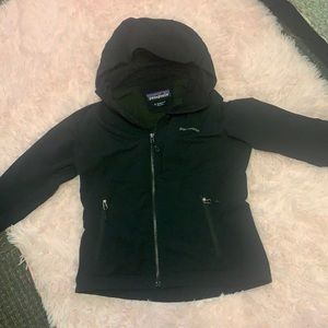 Black Patagonia raincoat